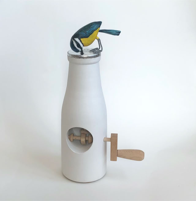 Blue Tit pecking on a milk bottle automata